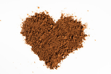 Poured heart-shaped cocoa powder, isolated on white background.