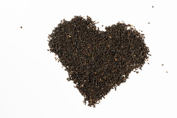 Black tea heart on white background.