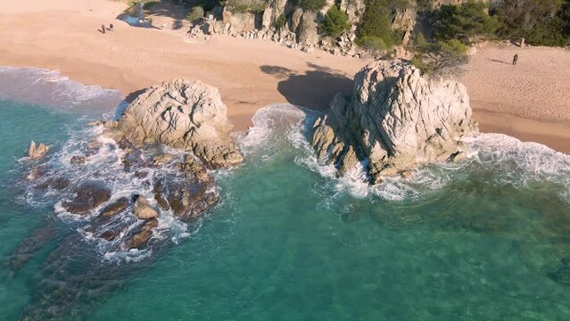 Costa Brava aerial images transparent water beach without people rocks and vegetation