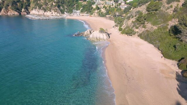 Aerial image taken with a drone of the Costa Brava of Gerona in Spain turquoise and transparent water Mediterranean sea paradisiacal beach