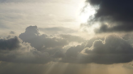 The beautiful city overlook view from the top of one skyscraper with the cloudy sky