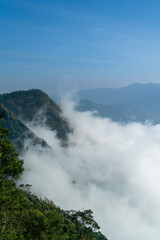 Amazing misty mountain scenery during foggy morning, beautiful click from Munnar Kolukkumalai