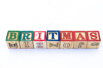 The phrase BRITMAS displayed visually on a clear background