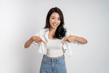 attractive asian woman with finger pointing down