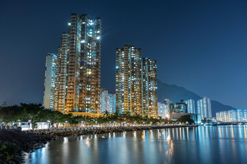 Obraz na płótnie Canvas High rise residential building in Hong Kong city at night