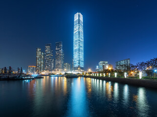 Fototapeta premium Night scenery of skyscraper, skyline and harbor of Hong Kong city