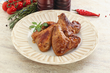 Roasted chicken wings with spicy sauce