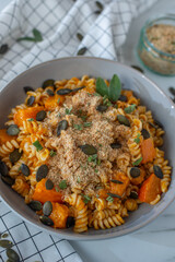 pasta alla zucca, healthy home made pumpkin pasta on a table
