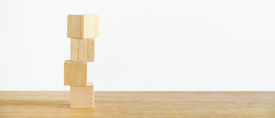 stack of wooden cube on desk without graphics including clipping path for Business design concept and activity for child foundation practice skills