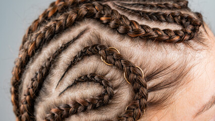 Close-up of braids on the head of a caucasian woman.