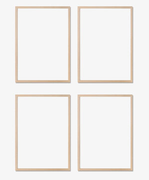 Picture Frame Mockup. Set Of Four Vertical Oak Wooden Frames On White Wall. Templates For Artwork, Painting Or Poster