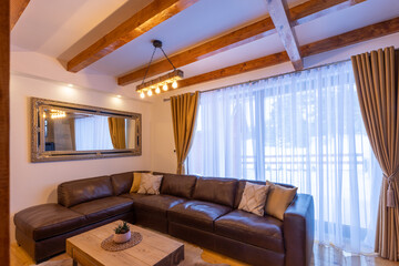Interior of a luxury living room with wooden details