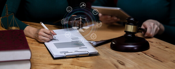 Concepts of Law and Legal services. Lawyer working with law interface icons. Blurred background.