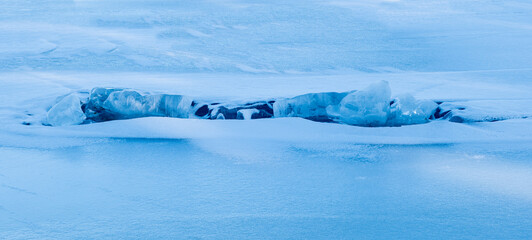 Abstract background of ice structure in a frozen lake landscape. Farnebofjarden national park in northof Sweden.