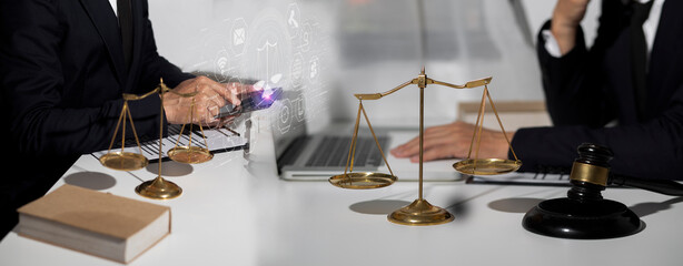 Concepts of Law and Legal services. Lawyer working with law interface icons. Blurred background.	