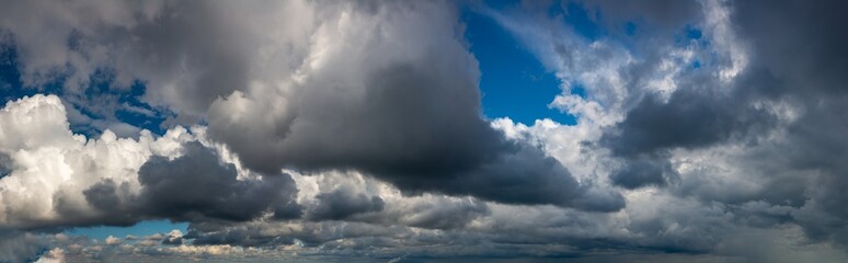 Obraz premium Fantastic soft thunderclouds, sky panorama