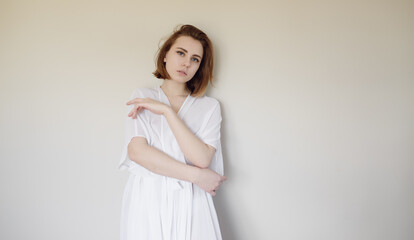 Portrait of a beautiful young woman with blue eyes.