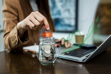 savings plan for the future concept, finance accounting, business hands holding coins putting in glass,