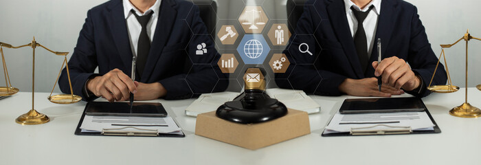 Concepts of Law and Legal services. Lawyer working with law interface icons. Blurred background.	