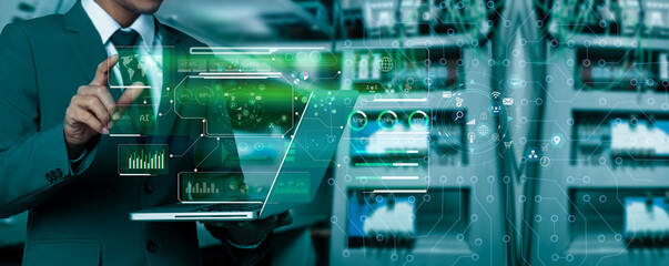 Future building construction engineering and technology project concept. double exposure graphic with engineer using digital laptop and smart industry and IOT software to control operation.