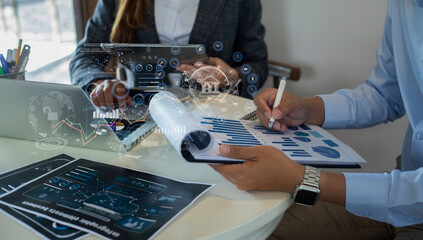 Technology and financial advisory services concert. Business teamwork and working on digital laptop computer with advisor showing plan of investment to clients at table office. Digital marketing.