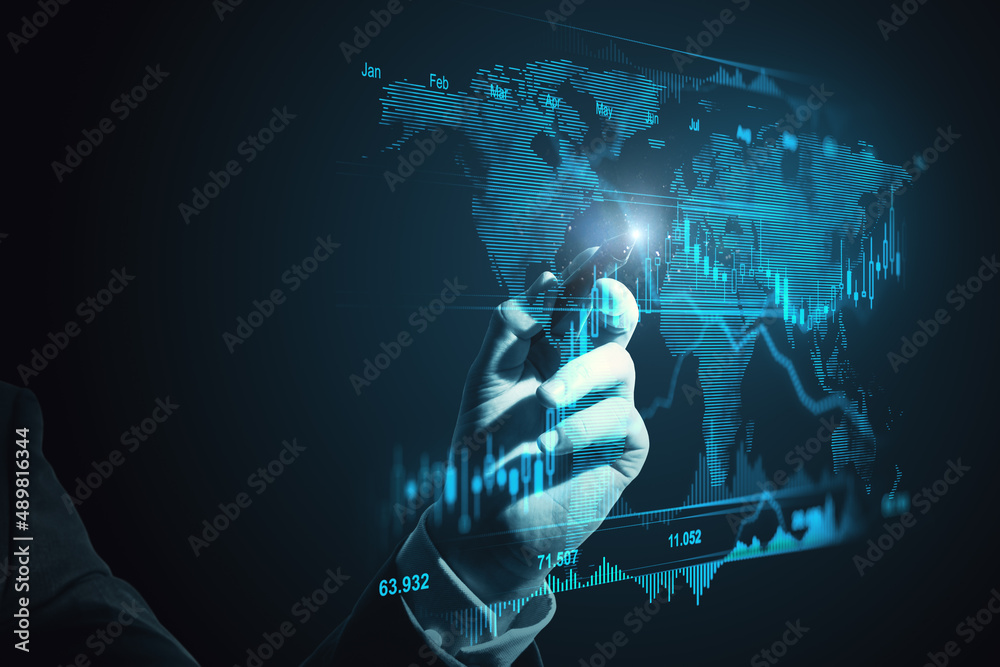 Poster close up of businessman hand with pen pointing at creative glowing forex chart with map on blue back