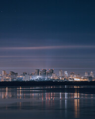 Fototapeta na wymiar the city of Dnipro. Panoramic view of the night city from the river. Ukraine.