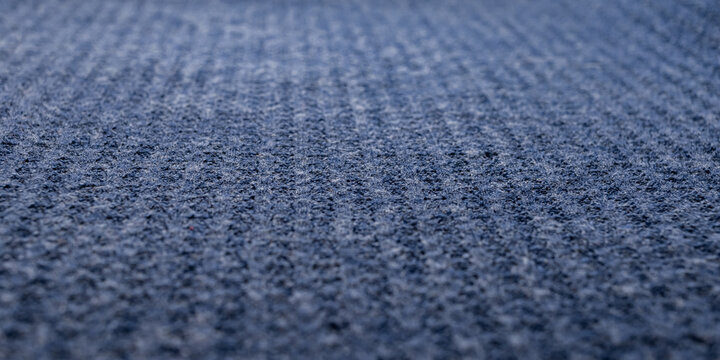 Dark blue knitted fabric textured. Textiles for the home.