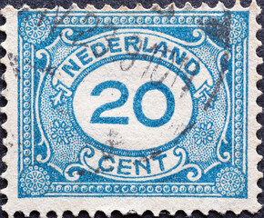 Netherlands - circa 1900: a postage stamp from the Netherlands , showing an ornament with number
