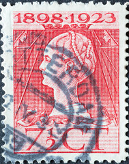Netherlands - circa 1923 : a postage stamp from the Netherlands , showing a portrait of Queen...