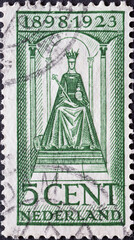 Netherlands - circa 1923 : a postage stamp from the Netherlands , showing Queen Wilhelmina...
