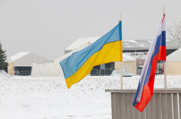 Two Flags of Russia and Ukraine. Conceptual photo, politics and world order, political truces,...