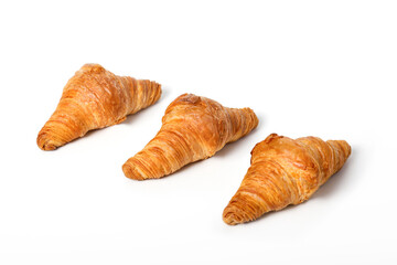 Delicious mini croissants isolated on white background