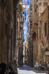 Fototapeta premium Typical view of a street in the historic center of Naples. 