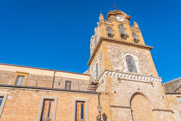 Fototapeta na wymiar View of the Ancient Medieval Adelasia Tower and Santa Maria La Cava Church in Aidone, Enna, Sicily, Italy, Europe