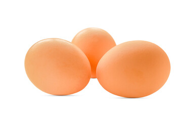 Three chicken eggs isolated on white background.
