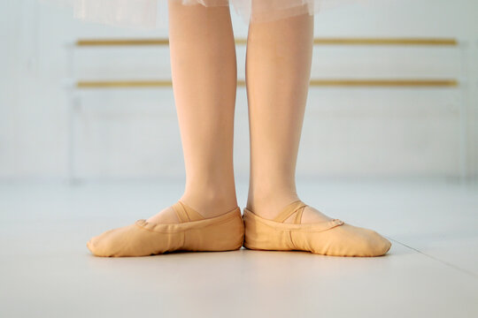 Ballet. A girl's legs. First position