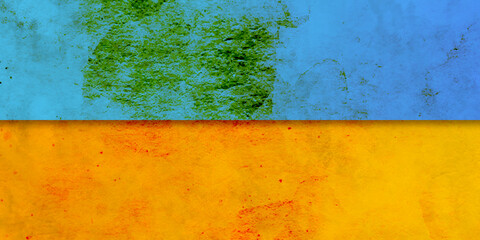 Ukraine flag on cracked wall with painted on grunge texture.