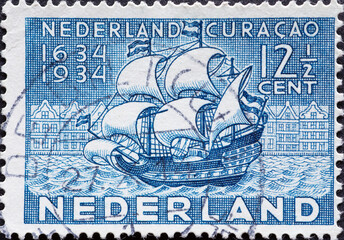 Netherlands - circa 1934: a postage stamp from the Netherlands , showing the historic sailing ship Van Walbeeck's Ship Nederland-Curaçao