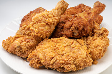 Fried chicken in white plate isolated on white background, Fried chicken on white.