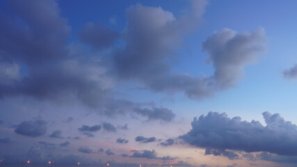 The beautiful sunset view with the colorful clouds and sky in the city