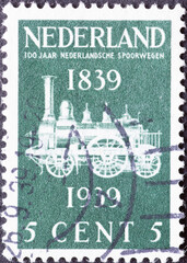 Netherlands - circa 1939: a postage stamp from the Netherlands , showing a historical locomotive 1A1 Tender Locomotive 
