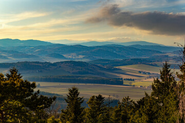 Evening landscape in South Czechia. View from Kluk mount. Early spring. - obrazy, fototapety, plakaty
