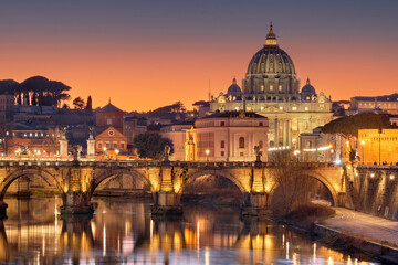 Fototapeta na wymiar Vatican City on the Tiber River at Dusk