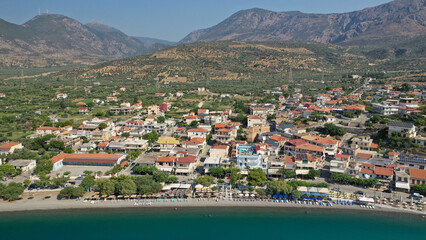 Fototapeta na wymiar Aerial drone photo of picturesque seaside village and beach of Eratini in Fokida prefecture as seen in summer, Greece