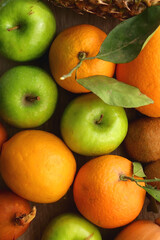 Various healthy fruit and vegetable on wooden background. Top view.