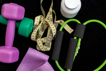 Women's sports accessories such as dumbbells yoga mat water ball.