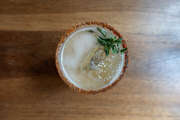 tequila orange cocktail with mint top view