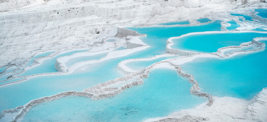 Natural travertine pools and terraces in Pamukkale. Cotton castle in southwestern Turkey. 