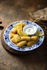 Homemade fish croquettes with lemon 